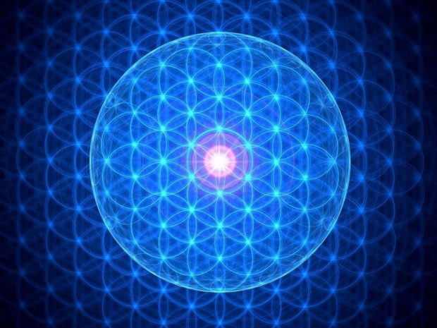 Fleur de vie : motif géométrique de cercles entrelacés, lumineux sur fond bleu